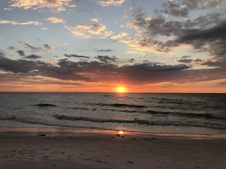 The sun near the horizon over the water at Clearwater Beach
